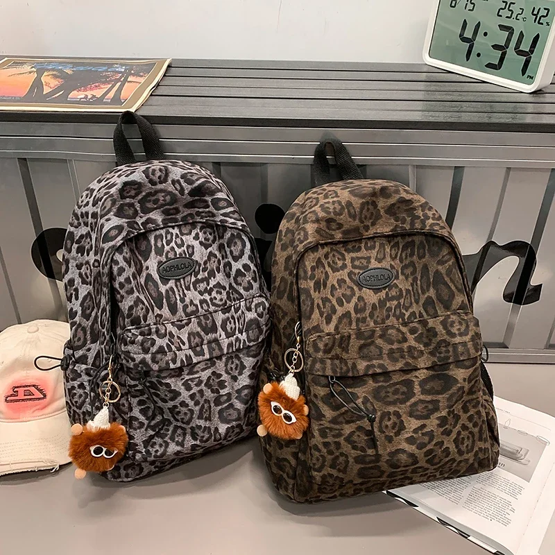 2026 Высококачественные нейлоновые школьные сумки с леопардовым принтом большой емкости, простые универсальные рюкзаки с карманом на молнии для женщин
2026 Высококачественные нейлоновые школьные сумки с леопардовым принтом большой емкости, простые универсальные рюкзаки с карманом на молнии для женщин