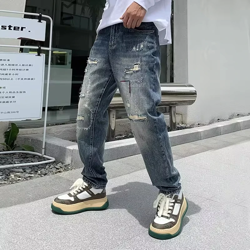 American New Fashion Men's Vintage Retro Blue Casual Trendy Hole Patched Straight Loose Denim Trousers Male Clothes Streetwear
American New Fashion Men's Vintage Retro Blue Casual Trendy Hole Patched Straight Loose Denim Trousers Male Clothes Streetwear