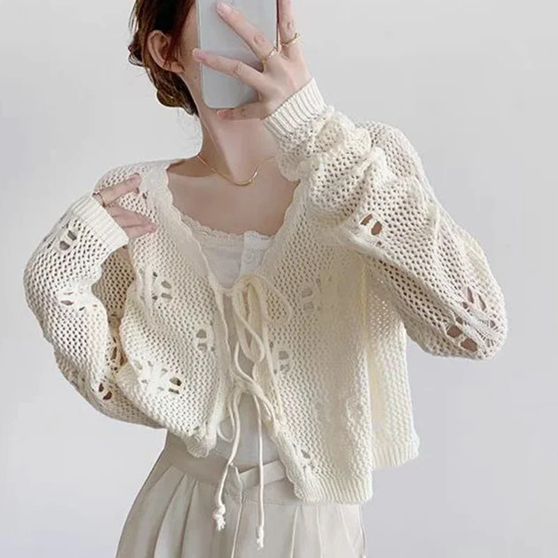Hollow Out Flower Knitting Women Cardigan Summer Korean Lace Up Female Cardigans Loose Chic Lazy Style Cropped Cardigans Ladies
Hollow Out Flower Knitting Women Cardigan Summer Korean Lace Up Female Cardigans Loose Chic Lazy Style Cropped Cardigans Ladies