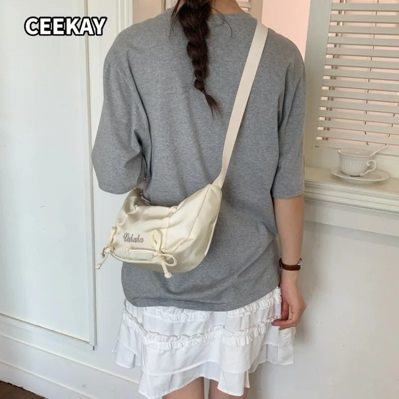 Multi-Color Canvas Crossbody Bag with Bow and Letter Embroidery Casual Style for Commuting Outdoor Activities, and Daily Errands
Multi-Color Canvas Crossbody Bag with Bow and Letter Embroidery Casual Style for Commuting Outdoor Activities, and Daily Errands