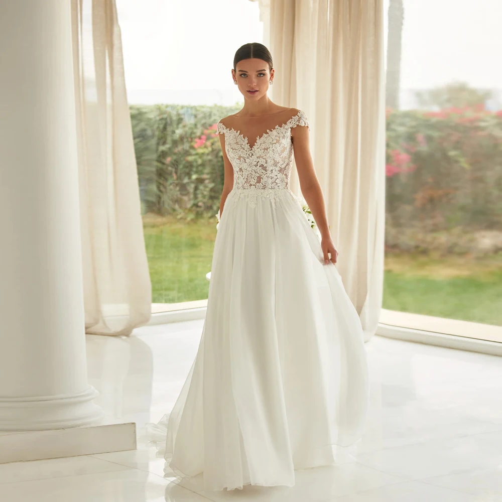 Elegant Chiffon Wedding Dresses O Neck Cap Sleeves Bridal Gowns Appliques Back Button Floor Length A-Line Vestidos De Novia 2024
Elegant Chiffon Wedding Dresses O Neck Cap Sleeves Bridal Gowns Appliques Back Button Floor Length A-Line Vestidos De Novia 2024
