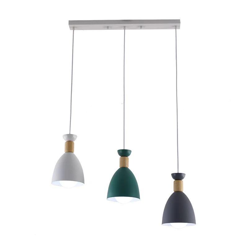 Nordic restaurant chandelier three-head household strip creative dining table light bar disc light
Nordic restaurant chandelier three-head household strip creative dining table light bar disc light