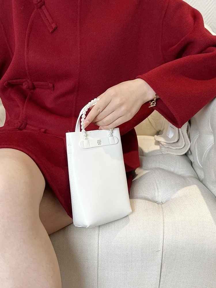 2023 New Chinese Button Double Sided Wool Coat for Women's Autumn and Winter Loose and Luxury Set Skirt
2023 New Chinese Button Double Sided Wool Coat for Women's Autumn and Winter Loose and Luxury Set Skirt