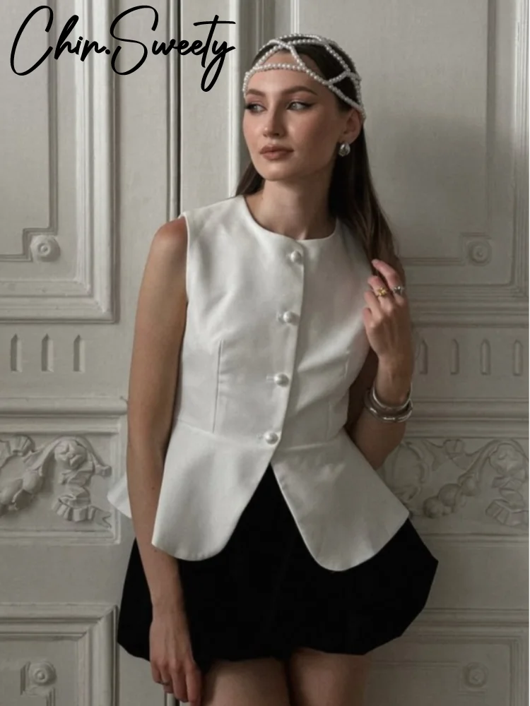 Жилет с круглым вырезом
Жилет с круглым вырезом