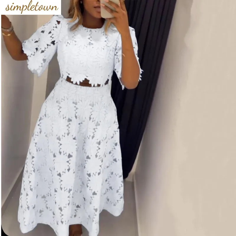 European and American style spring and summer new hollow top+fashionable casual skirt two-piece set
European and American style spring and summer new hollow top+fashionable casual skirt two-piece set