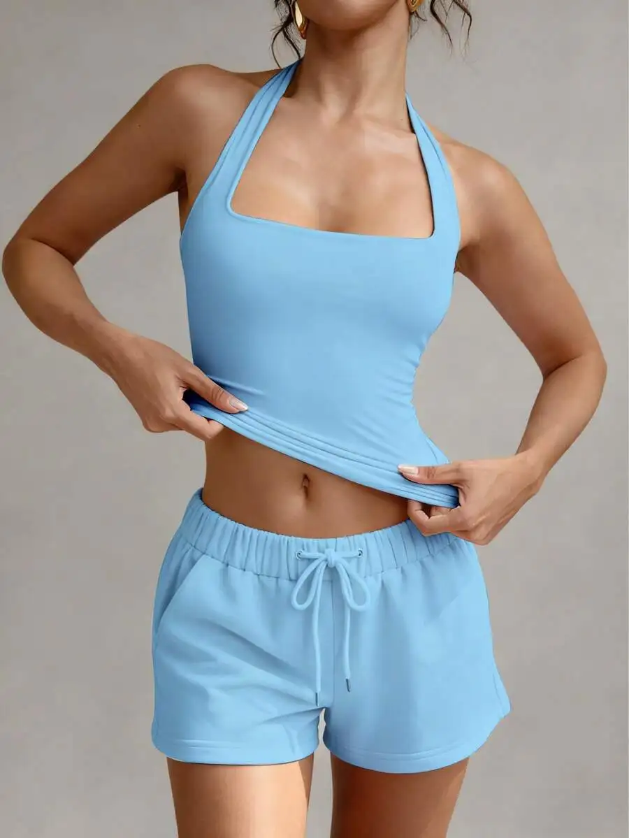 Синий комплект из укороченного топа с вырезом на шее и шорт — облегающий повседневный летний наряд
Синий комплект из укороченного топа с вырезом на шее и шорт — облегающий повседневный летний наряд