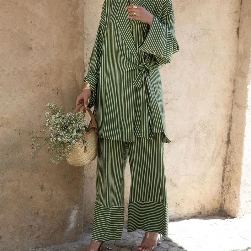 Casual women's striped suit women's cross-design lace-up long sleeve top wide leg trousers two-piece club clothing Vestidos
Casual women's striped suit women's cross-design lace-up long sleeve top wide leg trousers two-piece club clothing Vestidos