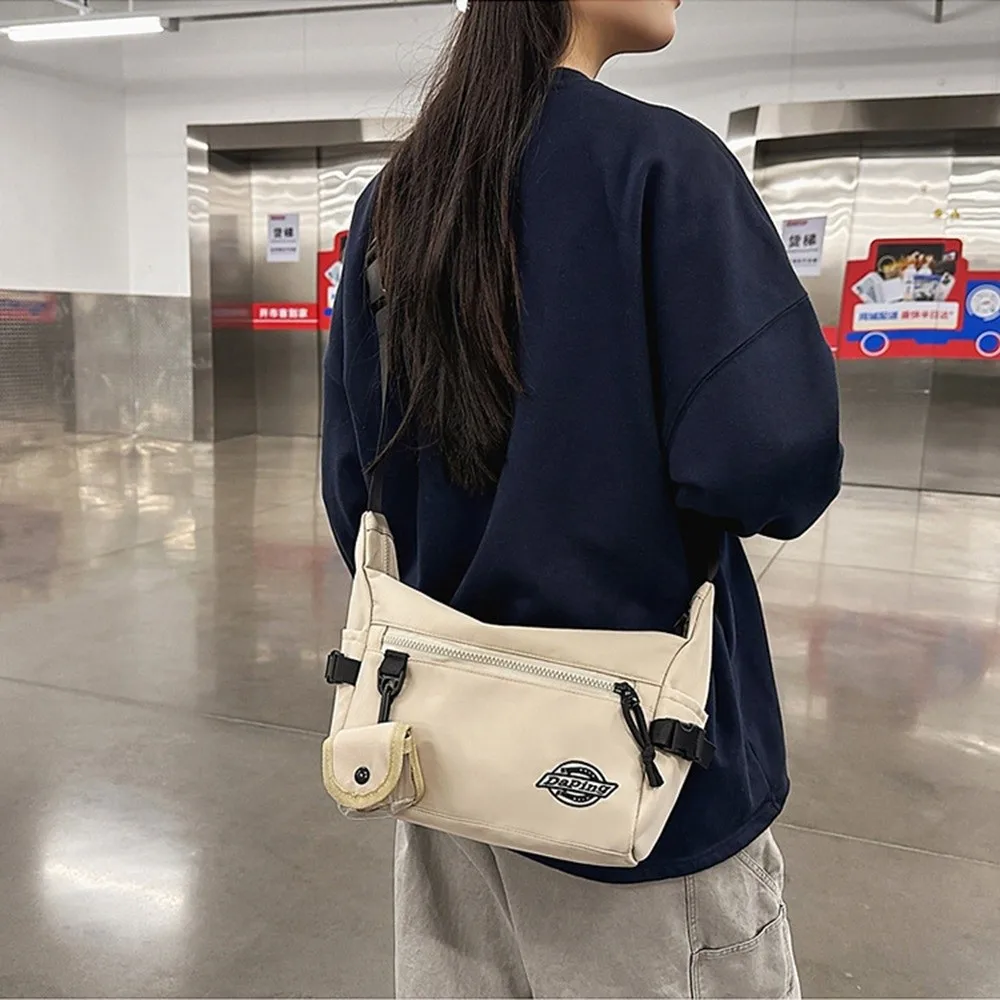 Многофункциональная сумка через плечо, спортивная нейлоновая сумка на плечо в корейском стиле, водонепроницаемая квадратная сумка на плечо в уличном стиле для мужчин
Многофункциональная сумка через плечо, спортивная нейлоновая сумка на плечо в корейском стиле, водонепроницаемая квадратная сумка на плечо в уличном стиле для мужчин