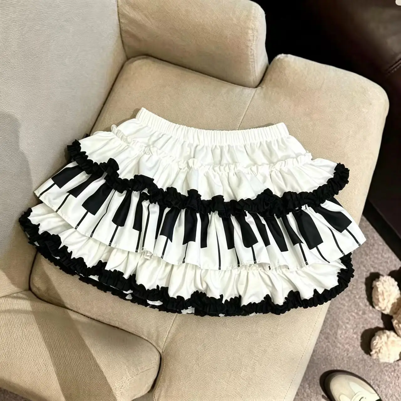 2026 Subculture Black White Piano Keys Fluffy Cake Skirt Punk Rock Vintage Slimming Anti Stripping Half Short Skirts
2026 Subculture Black White Piano Keys Fluffy Cake Skirt Punk Rock Vintage Slimming Anti Stripping Half Short Skirts