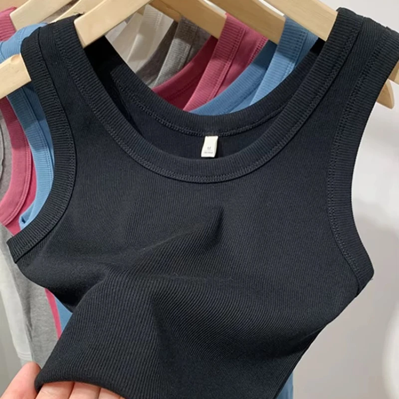 2025 summer women's sleeveless vest fashion cutting top O-neck fitness knitted ribbed vest women's solid short street wear
2025 summer women's sleeveless vest fashion cutting top O-neck fitness knitted ribbed vest women's solid short street wear