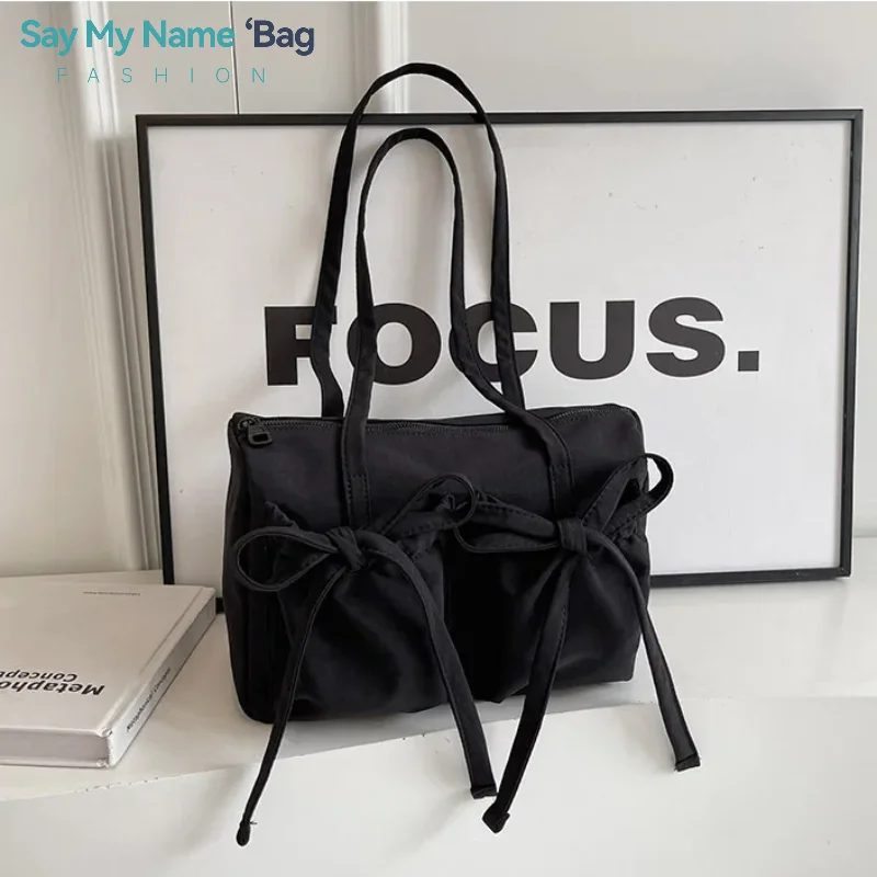 Casual Nylon Shoulder Bag 2025 New Unique Fresh Gentle Bow Design Travel Bag Solid Color Soft Large Capacity Women's Tote Bag
Casual Nylon Shoulder Bag 2025 New Unique Fresh Gentle Bow Design Travel Bag Solid Color Soft Large Capacity Women's Tote Bag