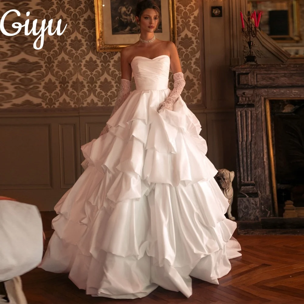 Giyu Elegant Satin A-line Sweetheart Wedding Dress Sleeveless Tiered Pleat Floor-Length Customized Bridal Gown vestidos de novia
Giyu Elegant Satin A-line Sweetheart Wedding Dress Sleeveless Tiered Pleat Floor-Length Customized Bridal Gown vestidos de novia