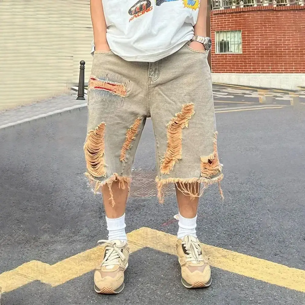 Мужские джинсовые шорты High Street с эффектом потертости и рваным краем, винтажный стиль, трикотаж из полиэфирного волокна
Мужские джинсовые шорты High Street с эффектом потертости и рваным краем, винтажный стиль, трикотаж из полиэфирного волокна