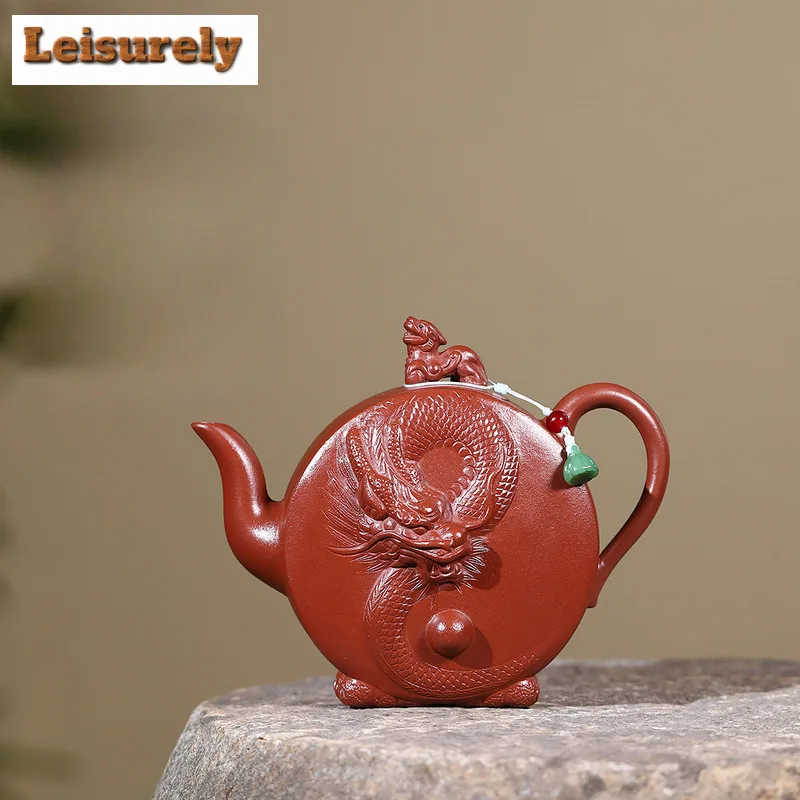 400 мл Изысканные фиолетовые глиняные чайники Исин ручной работы Dragon Pot Raw Ore Di Cao Qimg Mud Kettle с фильтром Zisha Tea Set Supplies 
400 мл Изысканные фиолетовые глиняные чайники Исин ручной работы Dragon Pot Raw Ore Di Cao Qimg Mud Kettle с фильтром Zisha Tea Set Supplies