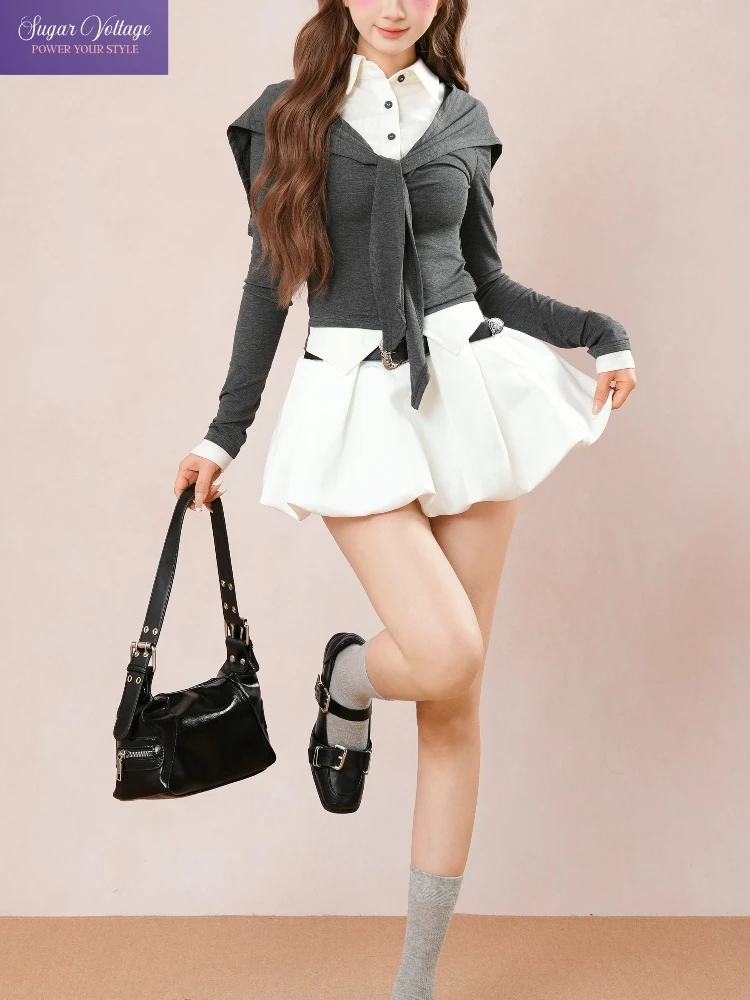 Корейская мода в студенческом стиле, серый искусственный топ с капюшоном из двух предметов + белая плиссированная юбка, комплект женской осенней милой повседневной элегантной одежды
Корейская мода в студенческом стиле, серый искусственный топ с капюшоном из двух предметов + белая плиссированная юбка, комплект женской осенней милой повседневной элегантной одежды