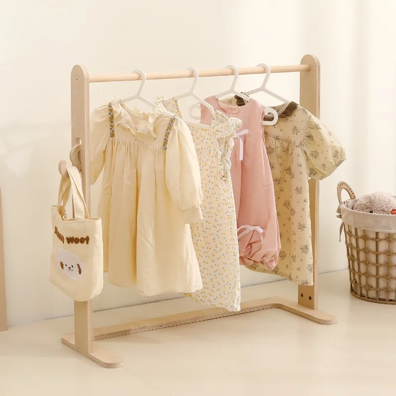 Children's hanger hanging clothes household floor wooden simple children's room layout kindergarten children's clothing
Children's hanger hanging clothes household floor wooden simple children's room layout kindergarten children's clothing