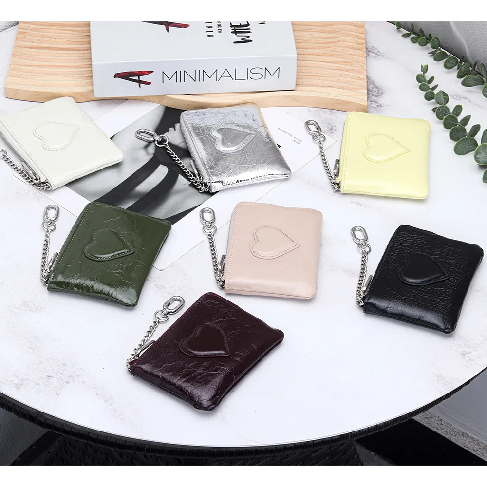 Маленький женский кошелек для монет в форме сердца из масляно-восковой воловьей кожи, кошелек для монет с карманом для монет
Маленький женский кошелек для монет в форме сердца из масляно-восковой воловьей кожи, кошелек для монет с карманом для монет