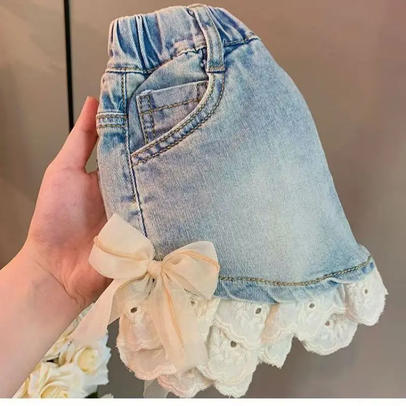 Girls Pants 2025 Summer Childrens Fashionable Lace Jeans Versatile Bow Casual Shorts Girls Summer Clothes
Girls Pants 2025 Summer Childrens Fashionable Lace Jeans Versatile Bow Casual Shorts Girls Summer Clothes