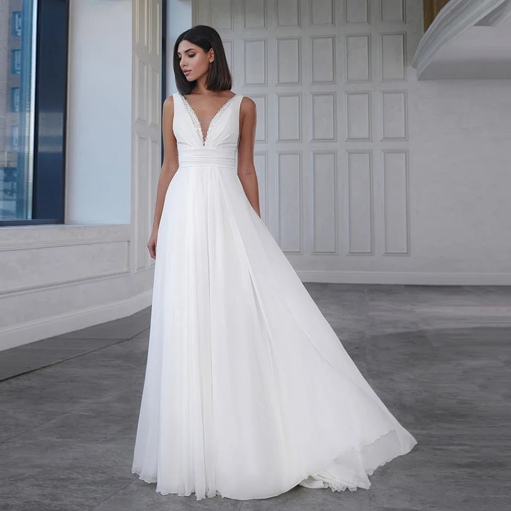 Deep V-Neck A-Line Wedding Dresses Lace Appliques Backless Court Train Chiffon Bridal Gown Sleeveless Boho Long Prom Dress
Deep V-Neck A-Line Wedding Dresses Lace Appliques Backless Court Train Chiffon Bridal Gown Sleeveless Boho Long Prom Dress