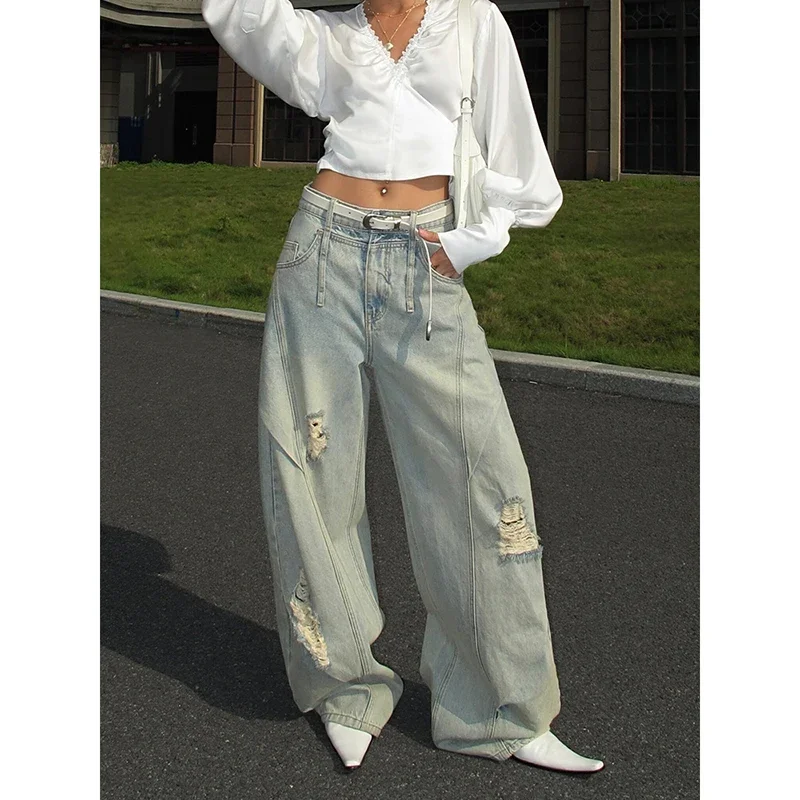 Streetwear Blue Vintage 2000s Aesthetic Ripped Jeans Women Loose Washed Y2K Wide Leg Pants Punk Baggy Harajuku Denim Trousers
Streetwear Blue Vintage 2000s Aesthetic Ripped Jeans Women Loose Washed Y2K Wide Leg Pants Punk Baggy Harajuku Denim Trousers