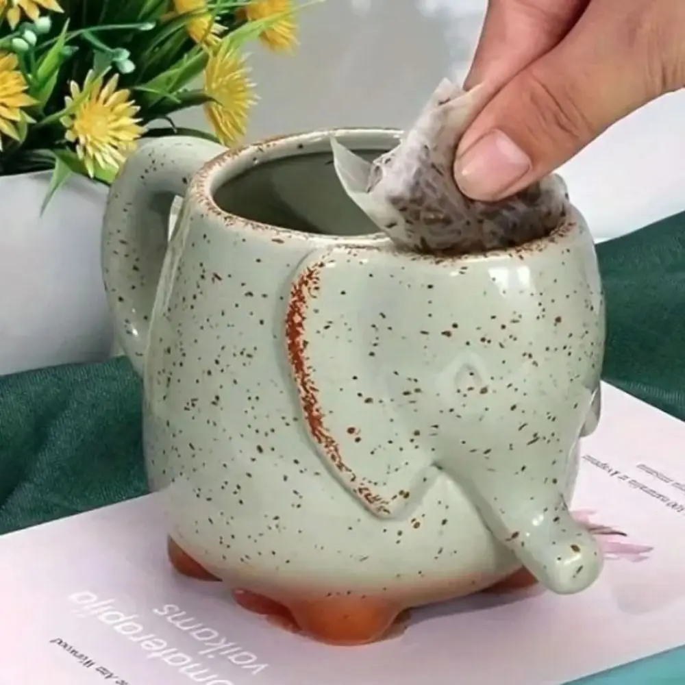 Посуда для напитков, керамическая кружка для чая со слоном, 3D с держателем для чайных пакетиков, чашка для чая, 15 унций, кофейная кружка, подарок
Посуда для напитков, керамическая кружка для чая со слоном, 3D с держателем для чайных пакетиков, чашка для чая, 15 унций, кофейная кружка, подарок