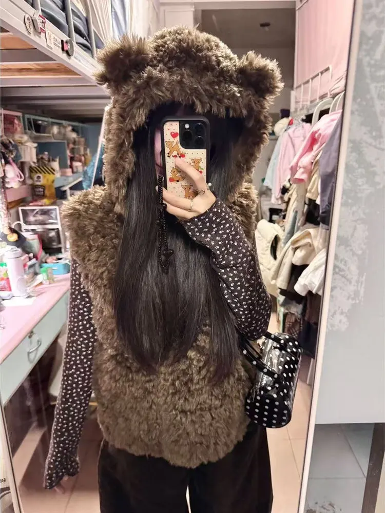 Милый жилет с капюшоном и ушками медведя из овечьего меха, женский, зимний, новый, на флисовой подкладке, утолщенный, теплый, повседневный, свободного кроя
Милый жилет с капюшоном и ушками медведя из овечьего меха, женский, зимний, новый, на флисовой подкладке, утолщенный, теплый, повседневный, свободного кроя