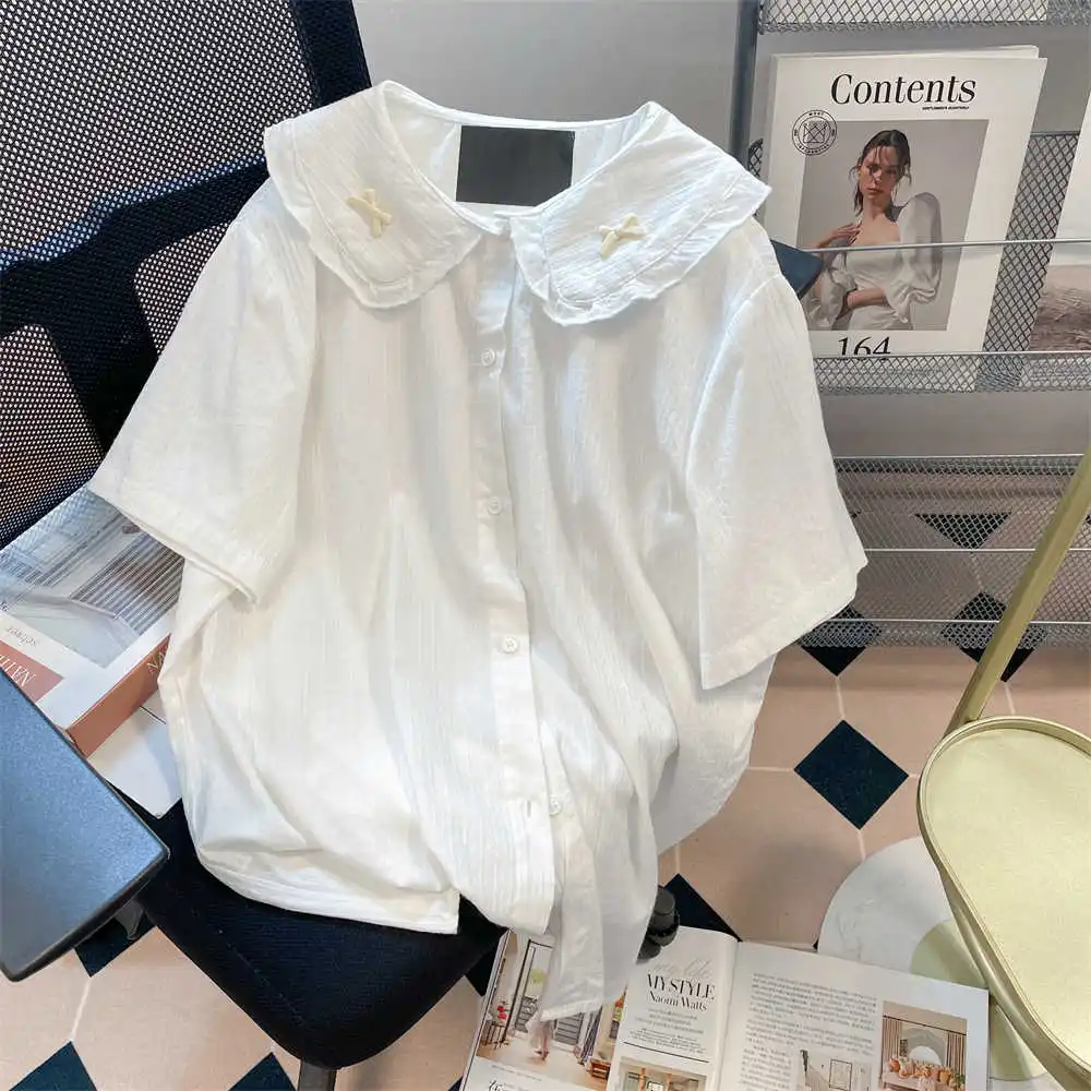 Women White Shirts Blouses Y2k 90s Aesthetic Vintage Korean 2000s Peter Pan Collar Short Sleeve Oversize Shirt Cutecore Clothes
Women White Shirts Blouses Y2k 90s Aesthetic Vintage Korean 2000s Peter Pan Collar Short Sleeve Oversize Shirt Cutecore Clothes