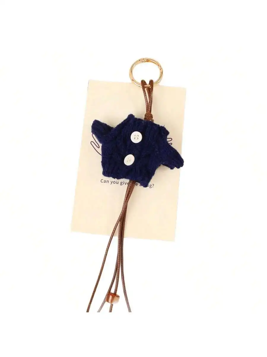 Mini Knitted Sweater Bag Charm With Buttons And Cord Tassel
Mini Knitted Sweater Bag Charm With Buttons And Cord Tassel