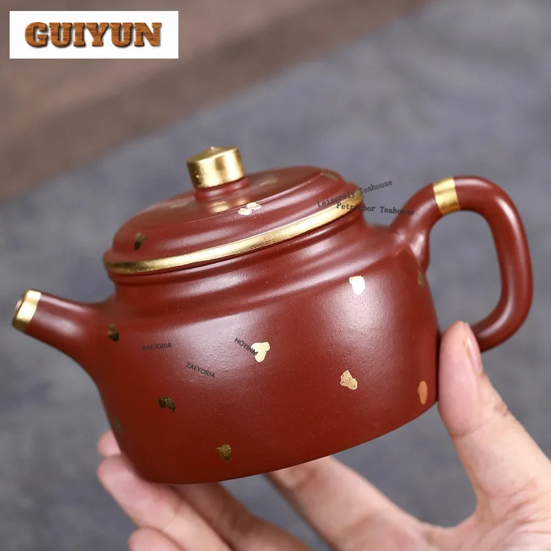 250ml Antique Yixing Purple Clay Teapots Handmade Sprinkle Gold De Zhong Pot Raw Ore Dahongpao Mud Kettle Zisha Tea Set For Tea
250ml Antique Yixing Purple Clay Teapots Handmade Sprinkle Gold De Zhong Pot Raw Ore Dahongpao Mud Kettle Zisha Tea Set For Tea