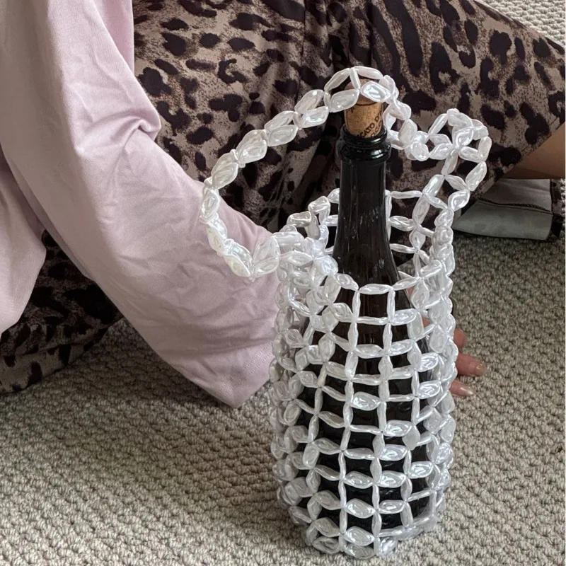Creative Woven Mesh Pocket Hollow Handbag Pendant Living Room Entrance Wine Cabinet Red Wine Jewelry Storage Bag Home Decoration
Creative Woven Mesh Pocket Hollow Handbag Pendant Living Room Entrance Wine Cabinet Red Wine Jewelry Storage Bag Home Decoration