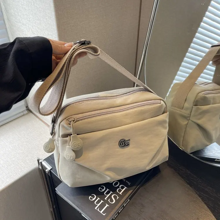 Faionable 2025 Новая нейлоновая квадратная сумка, женская сумка через плечо, легкая, водонепроницаемая, многоэтажная, простой дизайн
Faionable 2025 Новая нейлоновая квадратная сумка, женская сумка через плечо, легкая, водонепроницаемая, многоэтажная, простой дизайн