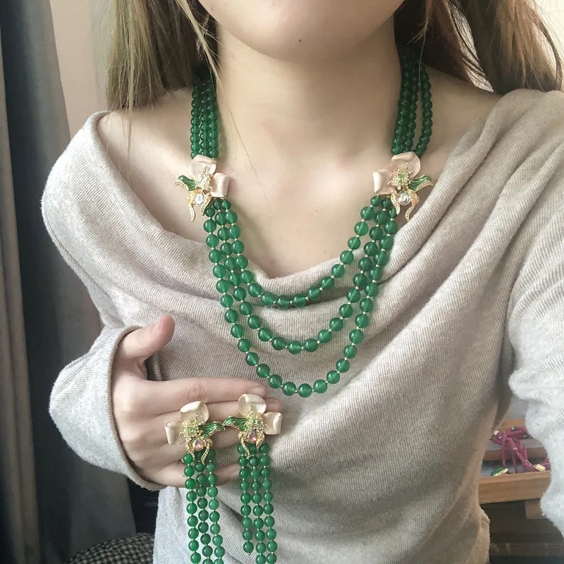 Medieval Niche Light Luxury Literary and Fashion Green Agate Multi-layer Beaded Flower Stud Earrings Fringed Necklace
Medieval Niche Light Luxury Literary and Fashion Green Agate Multi-layer Beaded Flower Stud Earrings Fringed Necklace