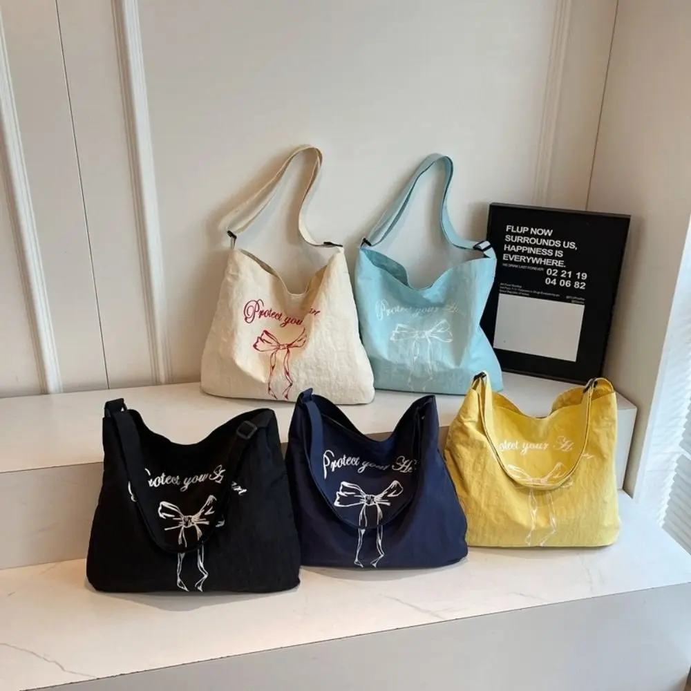 Simple Korean Women's Tote Bag Large Capacity Leisure Bow Shoulder Bag Nylon Versatile Commute Bag Handbags
Simple Korean Women's Tote Bag Large Capacity Leisure Bow Shoulder Bag Nylon Versatile Commute Bag Handbags