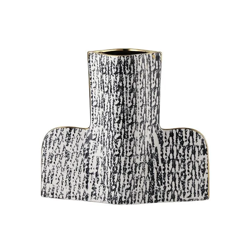 New Chinese light luxury abstract texture Phnom Penh ceramic vase model room club living room dining table
New Chinese light luxury abstract texture Phnom Penh ceramic vase model room club living room dining table