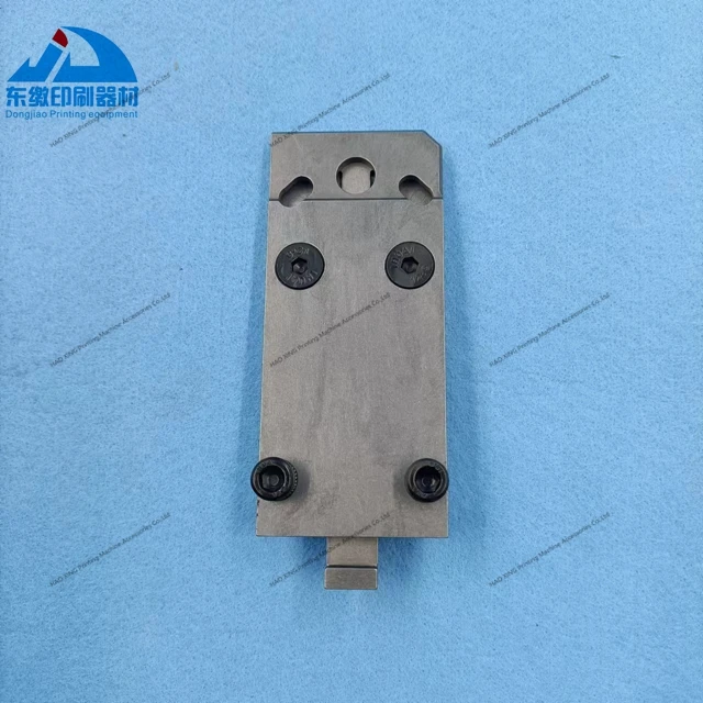 Hot Sale 1 Piece Stitching Head 1550.0023 for Muller Martini Offset Printing Machinery Spare Parts Nail Head With High Quality
Hot Sale 1 Piece Stitching Head 1550.0023 for Muller Martini Offset Printing Machinery Spare Parts Nail Head With High Quality