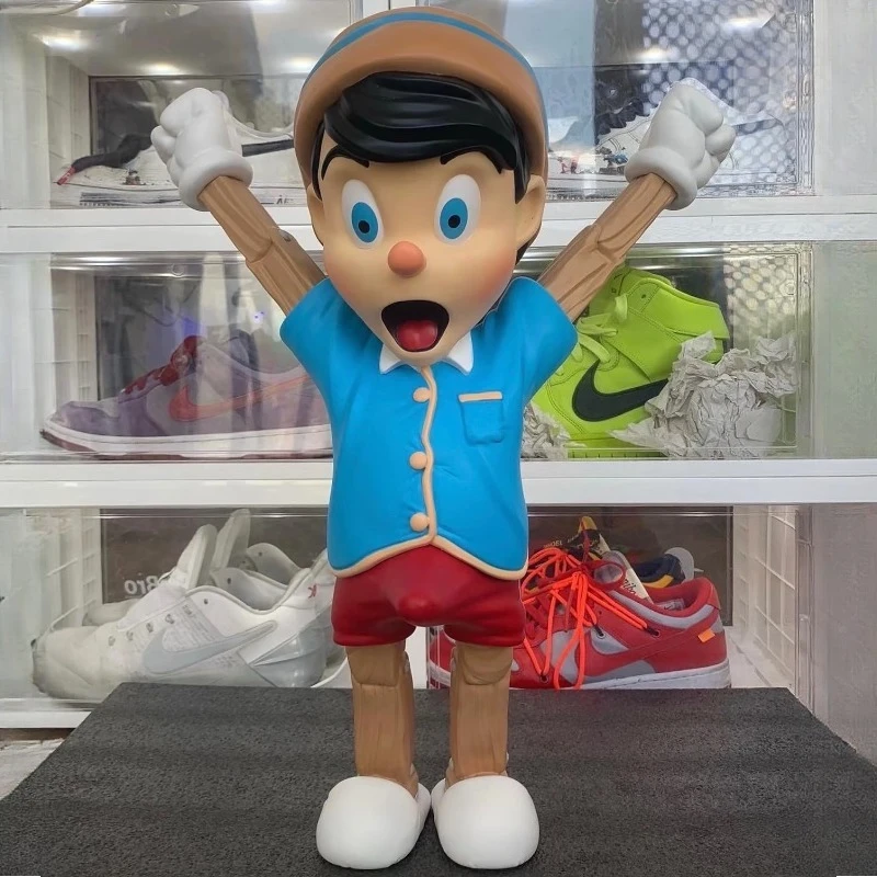 28cm Handicrafts Toys Pajamas Pinocchio Doll Resin Statues Desktop Ornament Disney Characters Home Decor Children's Gifts
28cm Handicrafts Toys Pajamas Pinocchio Doll Resin Statues Desktop Ornament Disney Characters Home Decor Children's Gifts