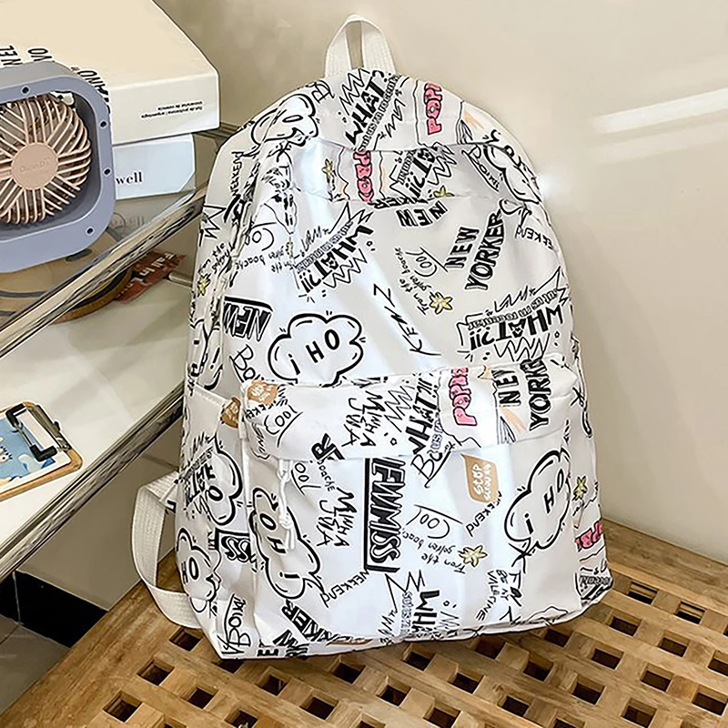 Graffiti Style Cute Backpack Simple Fashion Travel Bag Large Capacity Computer Backpack
Graffiti Style Cute Backpack Simple Fashion Travel Bag Large Capacity Computer Backpack