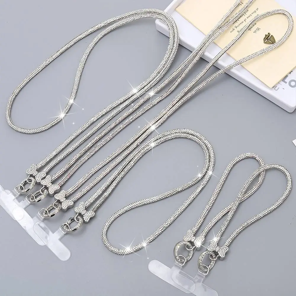 Модный блестящий ремешок для телефона со стразами и кристаллами с бантом, блестящий телефон, анти-потерянный веревочный ремешок на запястье для женщин и девочек
Модный блестящий ремешок для телефона со стразами и кристаллами с бантом, блестящий телефон, анти-потерянный веревочный ремешок на запястье для женщин и девочек