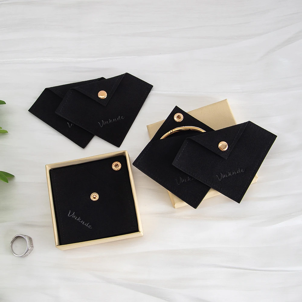 50 шт., черные ювелирные изделия с логотипом из микрофибры, треугольная сумка на кнопках, упаковка для свадебного подарка, сумка для кольца с бриллиантом на день рождения
50 шт., черные ювелирные изделия с логотипом из микрофибры, треугольная сумка на кнопках, упаковка для свадебного подарка, сумка для кольца с бриллиантом на день рождения