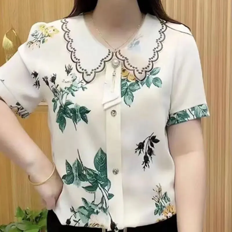 Women Summer Simplicity Fashion Floral Vintage Peter Pan Collar Short Sleeve Shirts Women Clothes Casual Loose All-match Tops
Women Summer Simplicity Fashion Floral Vintage Peter Pan Collar Short Sleeve Shirts Women Clothes Casual Loose All-match Tops