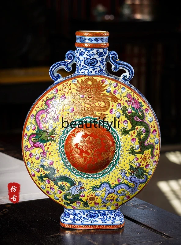 Hand-painted blue and white porcelain dragon and phoenix moon bottle Jingdezhen vase ceramic ornament Chinese entrance retro
Hand-painted blue and white porcelain dragon and phoenix moon bottle Jingdezhen vase ceramic ornament Chinese entrance retro