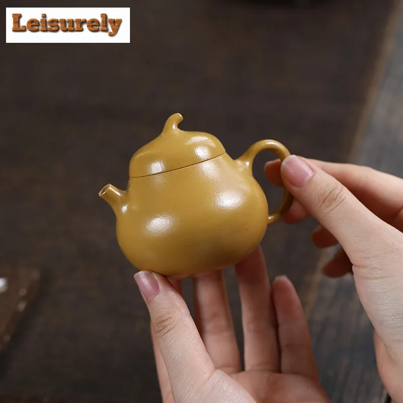 80ml Creative Yixing Purple Clay Teapots Handmade Eggplant Pot Raw Ore Gold Zhu Mud Kettle Chinese Zisha Tea Set Cafes Supplies
80ml Creative Yixing Purple Clay Teapots Handmade Eggplant Pot Raw Ore Gold Zhu Mud Kettle Chinese Zisha Tea Set Cafes Supplies