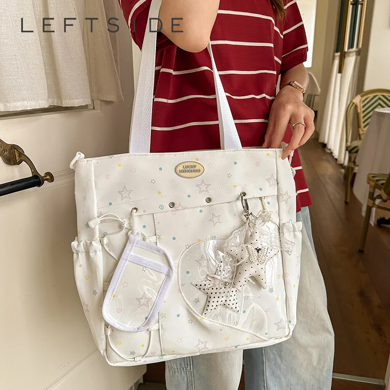 Korean Style Clear Window Pocket Tote Bag Women Star Pendant Large Capacity Daily School Handbags 2026 Fashion Shoulder Bags
Korean Style Clear Window Pocket Tote Bag Women Star Pendant Large Capacity Daily School Handbags 2026 Fashion Shoulder Bags