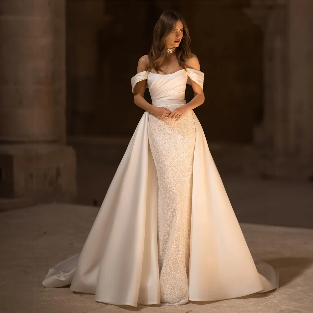 Off the Shoulder Satin Beaded Pleated Wedding Dress Sexy Mermaid with Removable Court Wedding Gowns for Bridal Customzied
Off the Shoulder Satin Beaded Pleated Wedding Dress Sexy Mermaid with Removable Court Wedding Gowns for Bridal Customzied