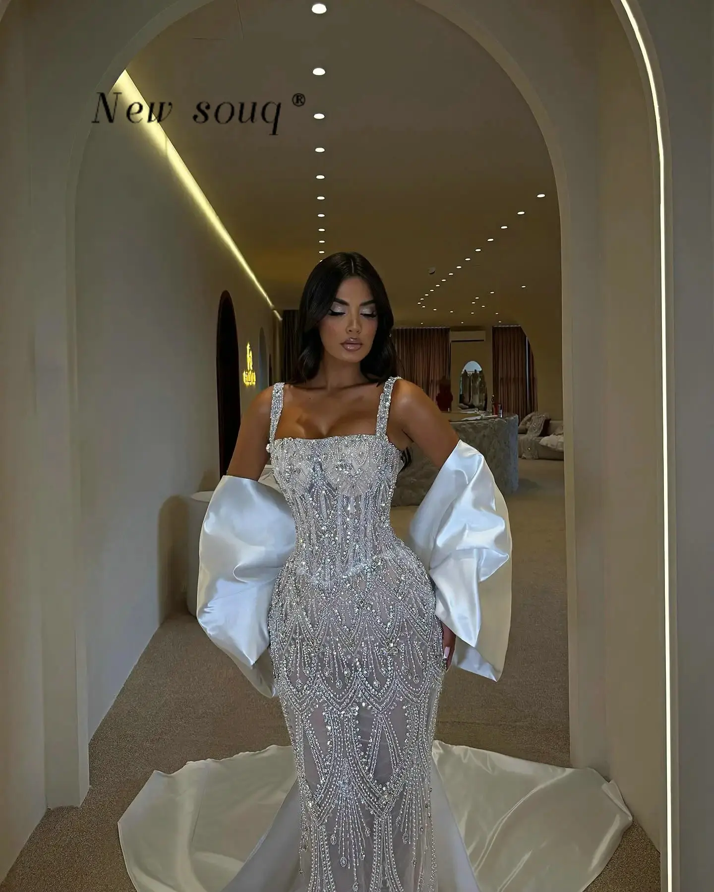 Белые вечерние платья-русалка на тонких бретелях с большим бантом на спине, индивидуальный пошив, 2026, роскошные расшитые бисером арабские свадебные и праздничные платья
Белые вечерние платья-русалка на тонких бретелях с большим бантом на спине, индивидуальный пошив, 2026, роскошные расшитые бисером арабские свадебные и праздничные платья