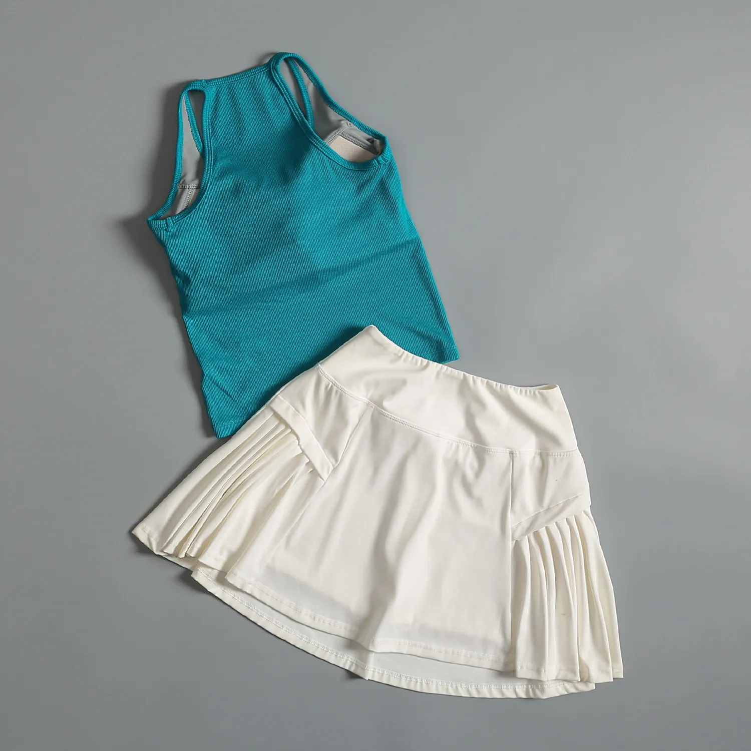 Tennis fitness suit for women summer all-in-one sports running quick-drying vest anti-exposure yoga tennis skirt
Tennis fitness suit for women summer all-in-one sports running quick-drying vest anti-exposure yoga tennis skirt