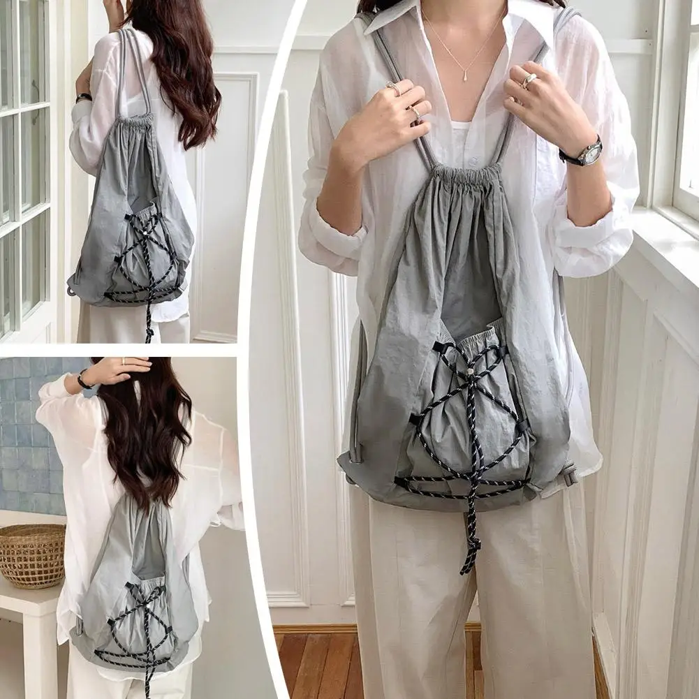 Повседневный рюкзак унисекс на шнурке, легкая нейлоновая дорожная сумка большой вместимости, мода 2025 г.
Повседневный рюкзак унисекс на шнурке, легкая нейлоновая дорожная сумка большой вместимости, мода 2025 г.