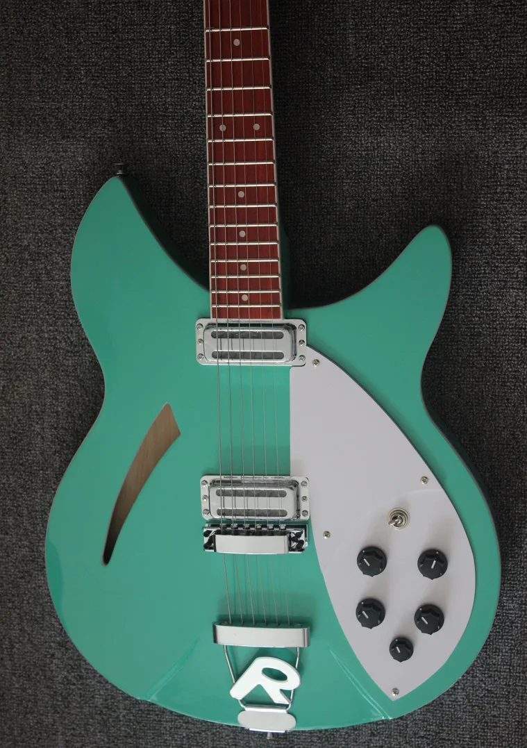 STLF Weifang 6 String Ricken 360 Electric Guitar in Light Green Colour 
STLF Weifang 6 String Ricken 360 Electric Guitar in Light Green Colour
