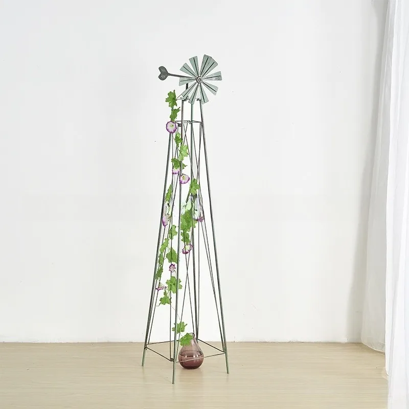 American clematis climbing vine flower stand, wrought iron rotating windmill vine moon climbing frame, courtyard villa 
American clematis climbing vine flower stand, wrought iron rotating windmill vine moon climbing frame, courtyard villa