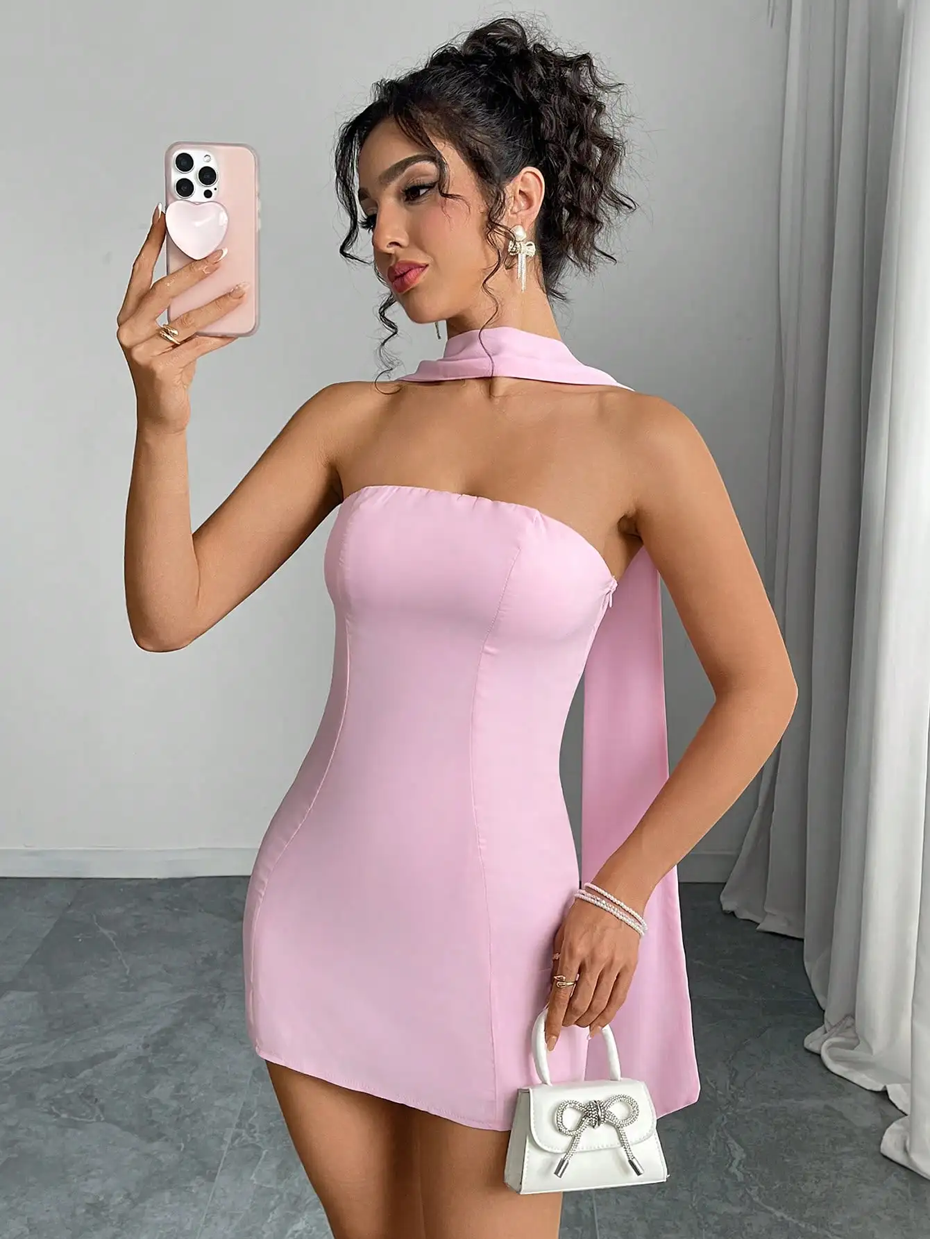 Pink Solid Halter Neck Bodycon Mini Dress with Scarf Detail
Pink Solid Halter Neck Bodycon Mini Dress with Scarf Detail